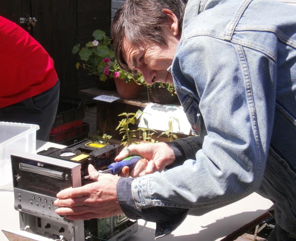 June 29th 2011: factory worker Alan dismantles electronic waste in search of usable bits.